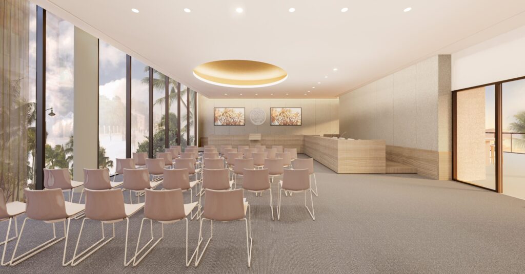 Conference room with rows of chairs and a round ceiling light