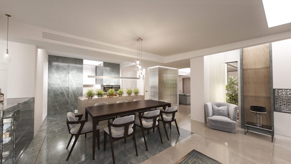 A dining area with a dark wood table and chairs in front of a gray marble wall, with planters on a long counter.