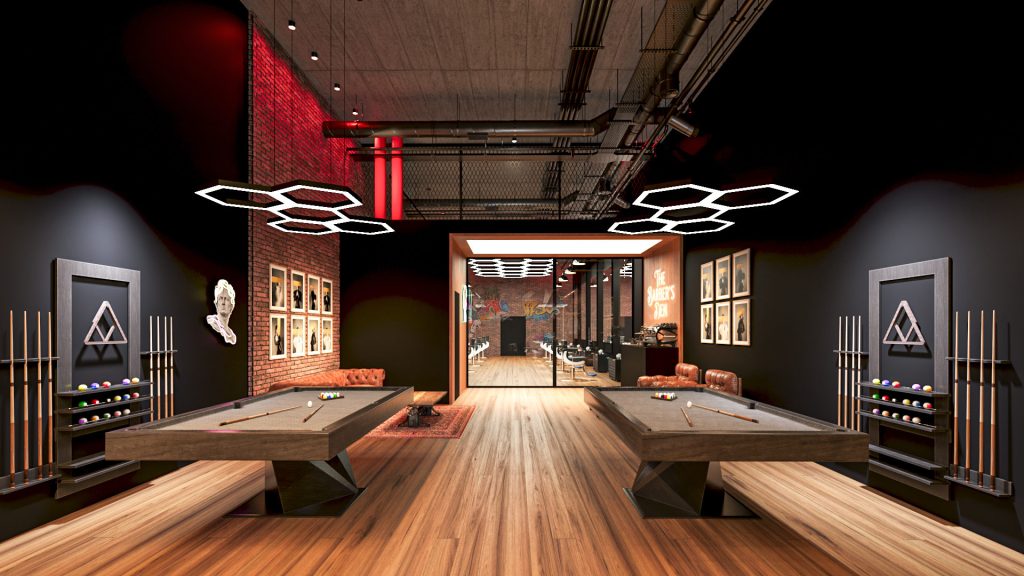 A billiards corner with two pool tables under hexagonal lights, cue racks on black walls and framed prints on the brick.