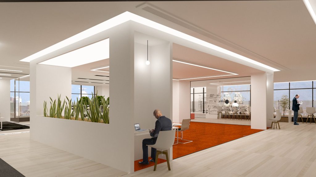 A white open booth with a desk and planters on an orange carpet, in an office with tall windows.