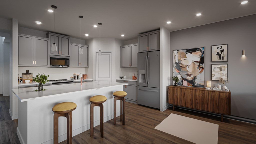 A kitchen with gray cabinets, a white island with wood stools, pendant lights and abstract art above a walnut sideboard.