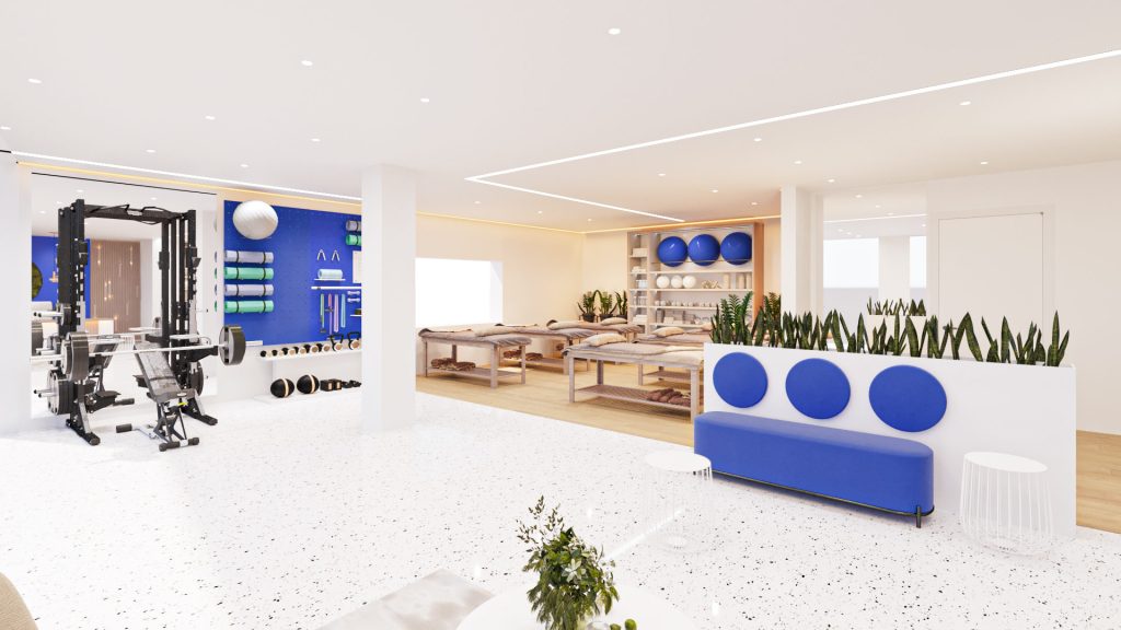 A training corner with a weight rack and machines beside a blue pegboard wall, next to a lounge with blue seat pads and planters.