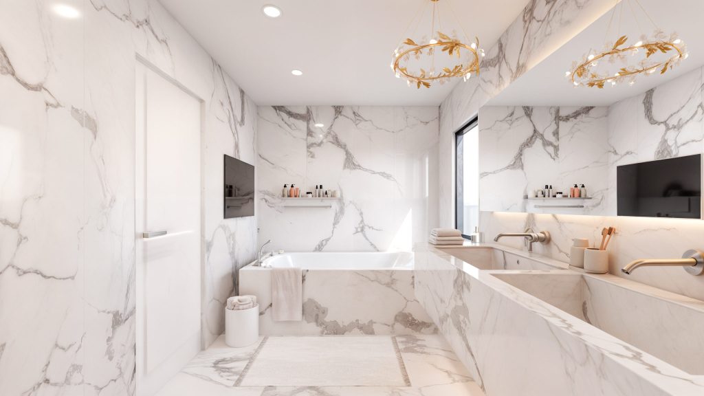 A marble-clad soaking tub with gold fixtures, gold ring chandeliers and a wall-mounted TV in a white marble bathroom.