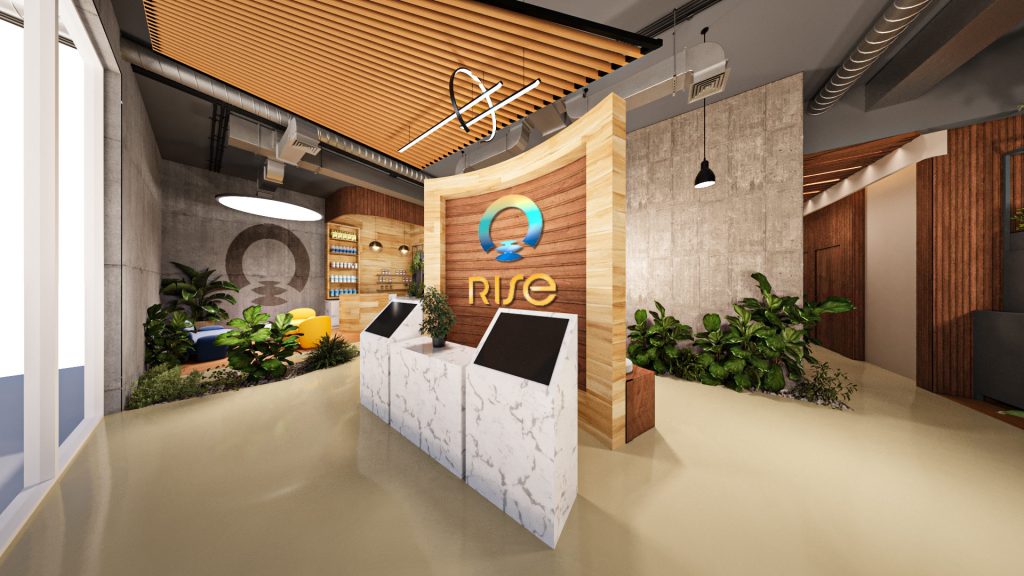 A reception with a white counter in front of a wood wall with the logo, planted beds along the floor and shop shelving on both sides.